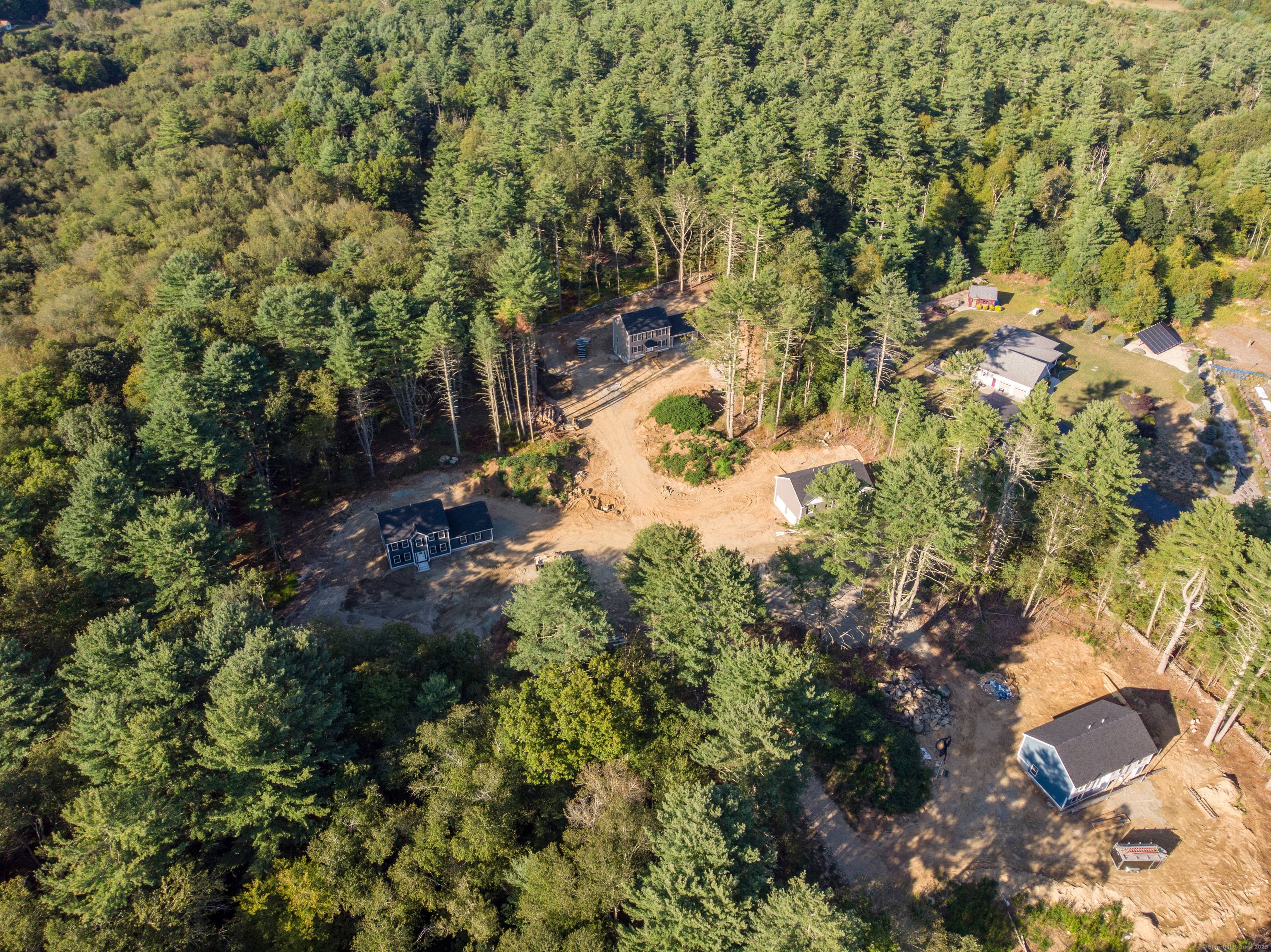 This is the last home available in a Beautiful wooded 4 lot subdivision !