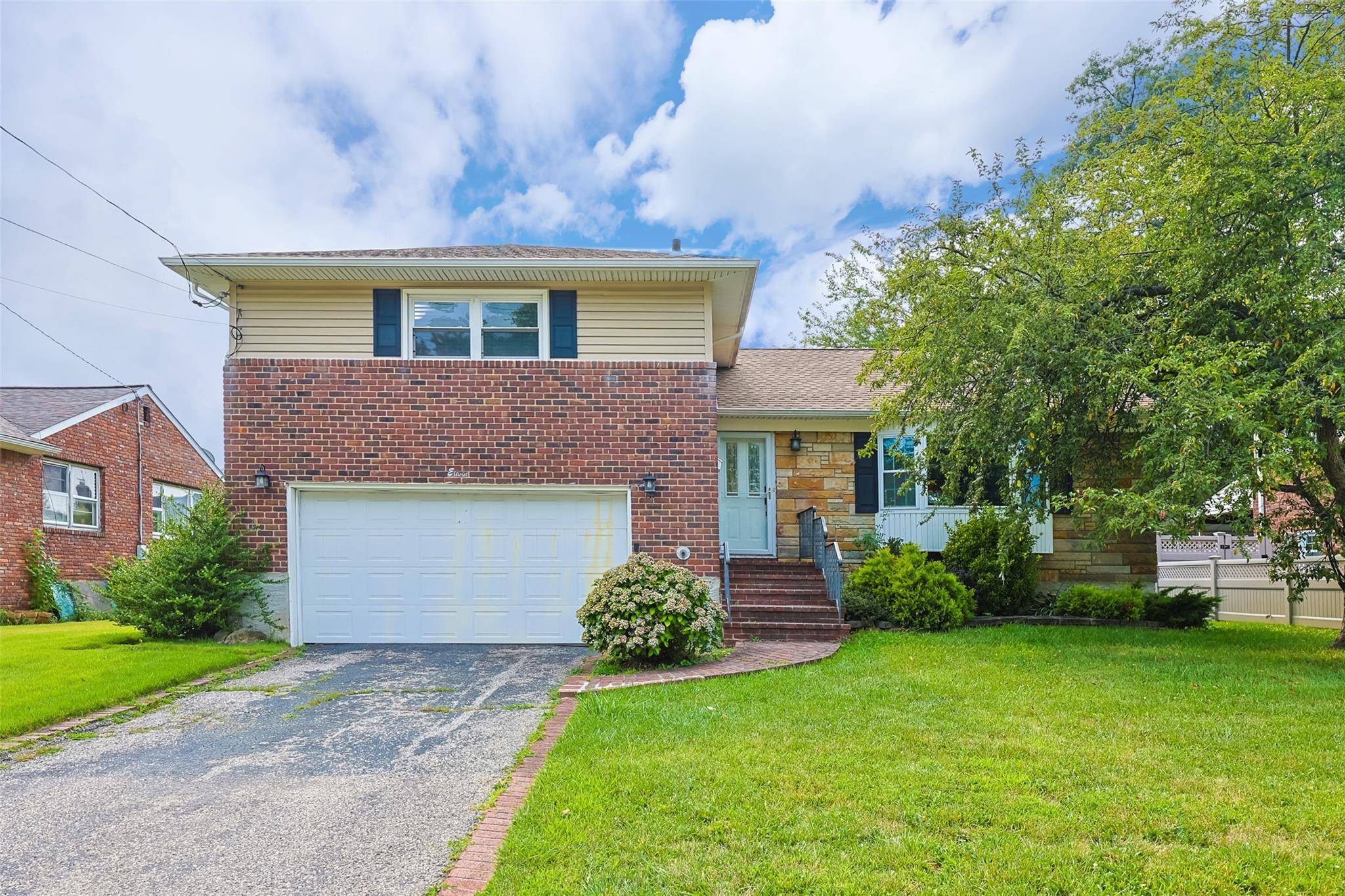 Welcome to this spacious and bright split level home, thoughtfully designed with modern living in mind.