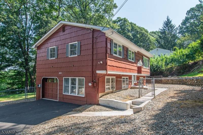 Well maintained 3 4 Bedroom Home with Seasonal Lake Views !