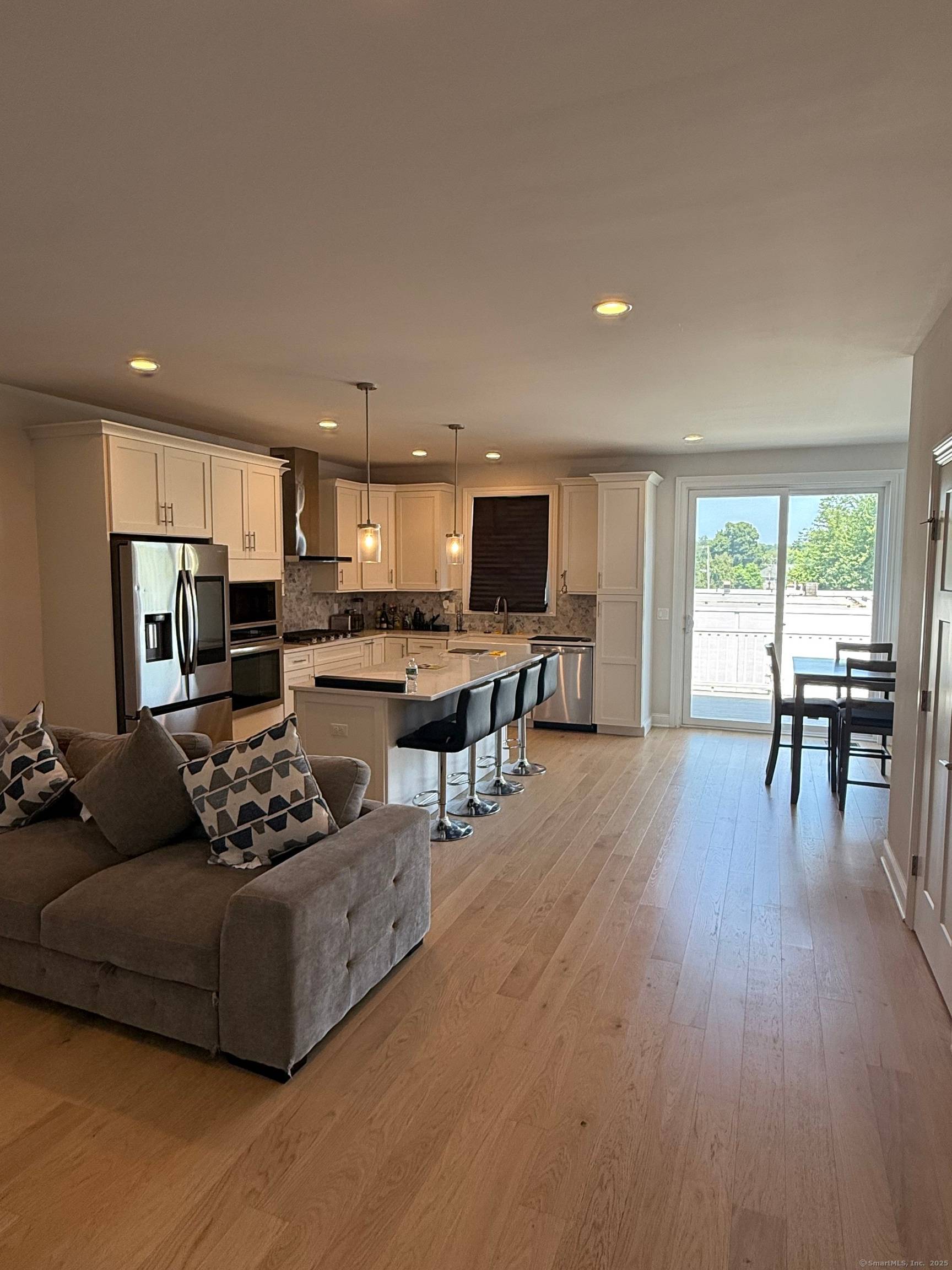 Motivated Seller ! Skip the wait on new construction and step into this upgraded end unit townhome at The Reserve at Stonebridge Crossing.