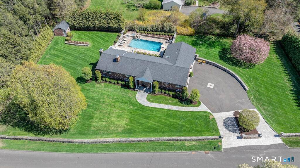 Welcome to 20 Brushwood Road, a beautifully renovated modern home set in one of Stamford's most peaceful residential neighborhoods.
