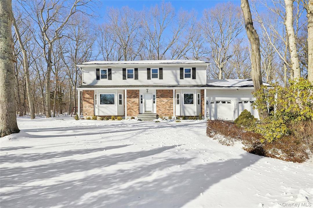 Fall in love with this beautiful center hall Colonial, perfectly set at the center of a cul de sac on 0.