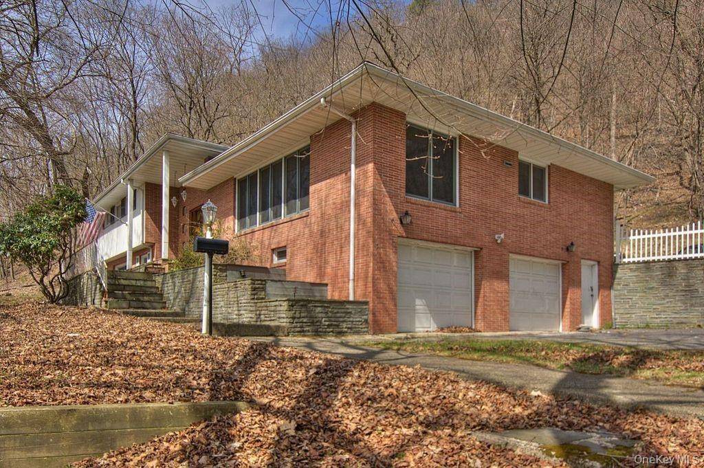 Come see this 4 bedroom 4 bath split level home located on a wooded.