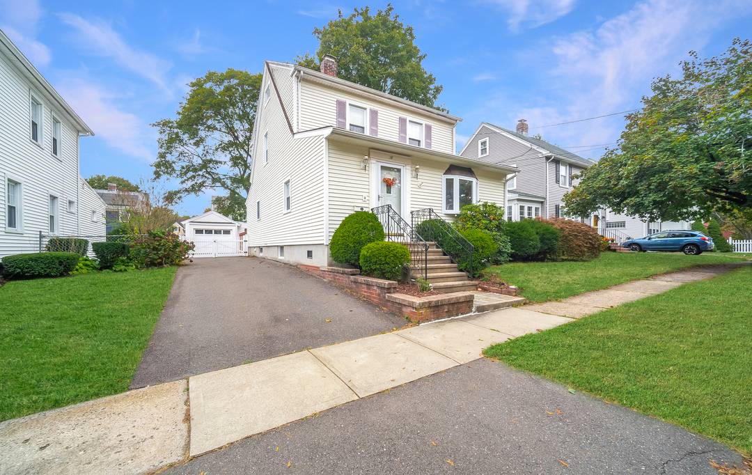 Welcome to 18 Ingram Street, a beautifully maintained Colonial home nestled in the HEART of Spring Glen !