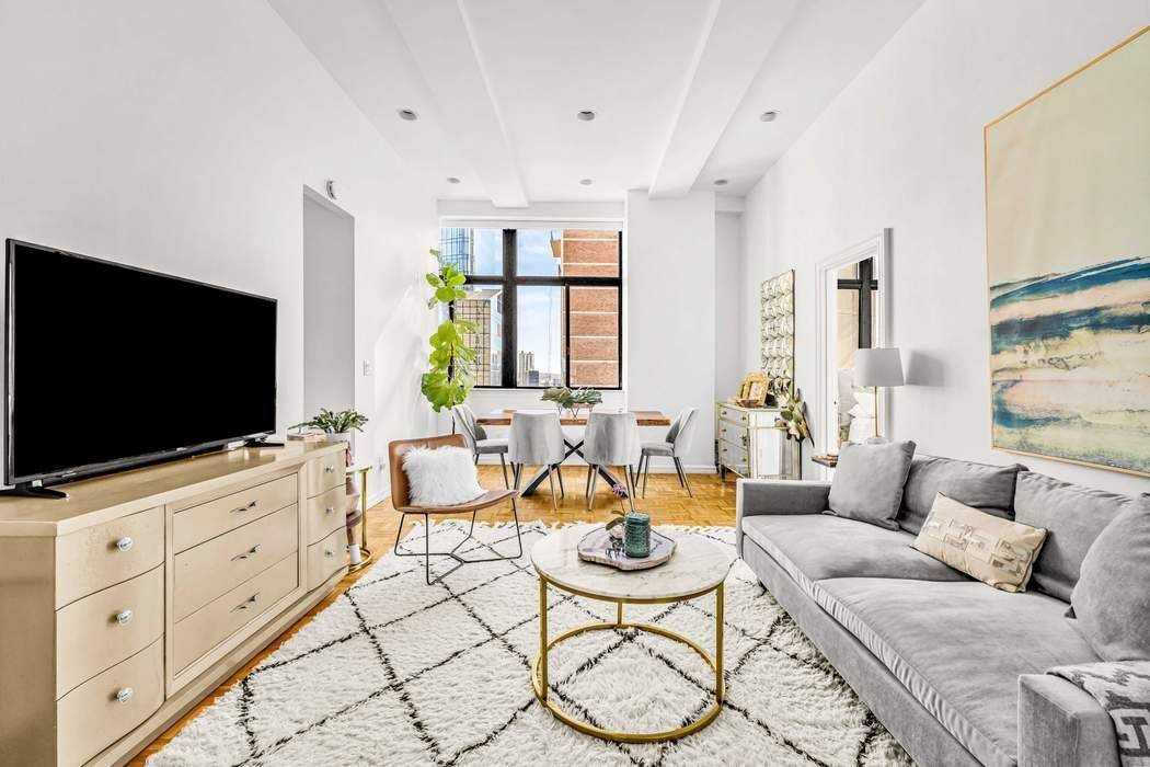 Welcome to Residence 19M at Turtle Bay Towers a sunlit corner unit in the building s most coveted line.