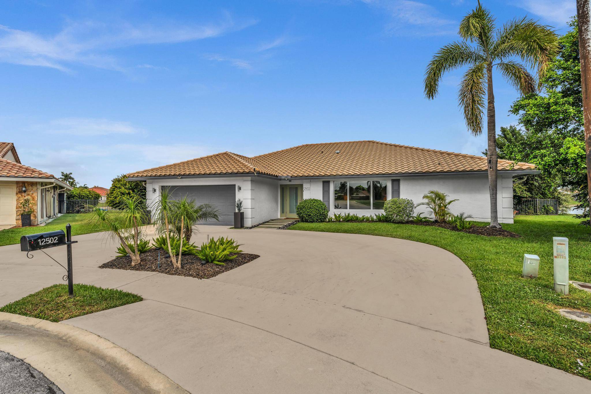 Totally renovated 3BR 2 BATH home with a bonus office and private pool oasis for rent in Boca Winds !