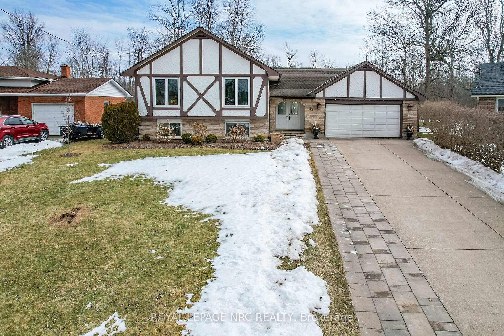Welcome to 12 Englewood Court where you will find the ideal home with an excellent floor plan and a backyard inground pool looking out to the beautiful treed area with ...