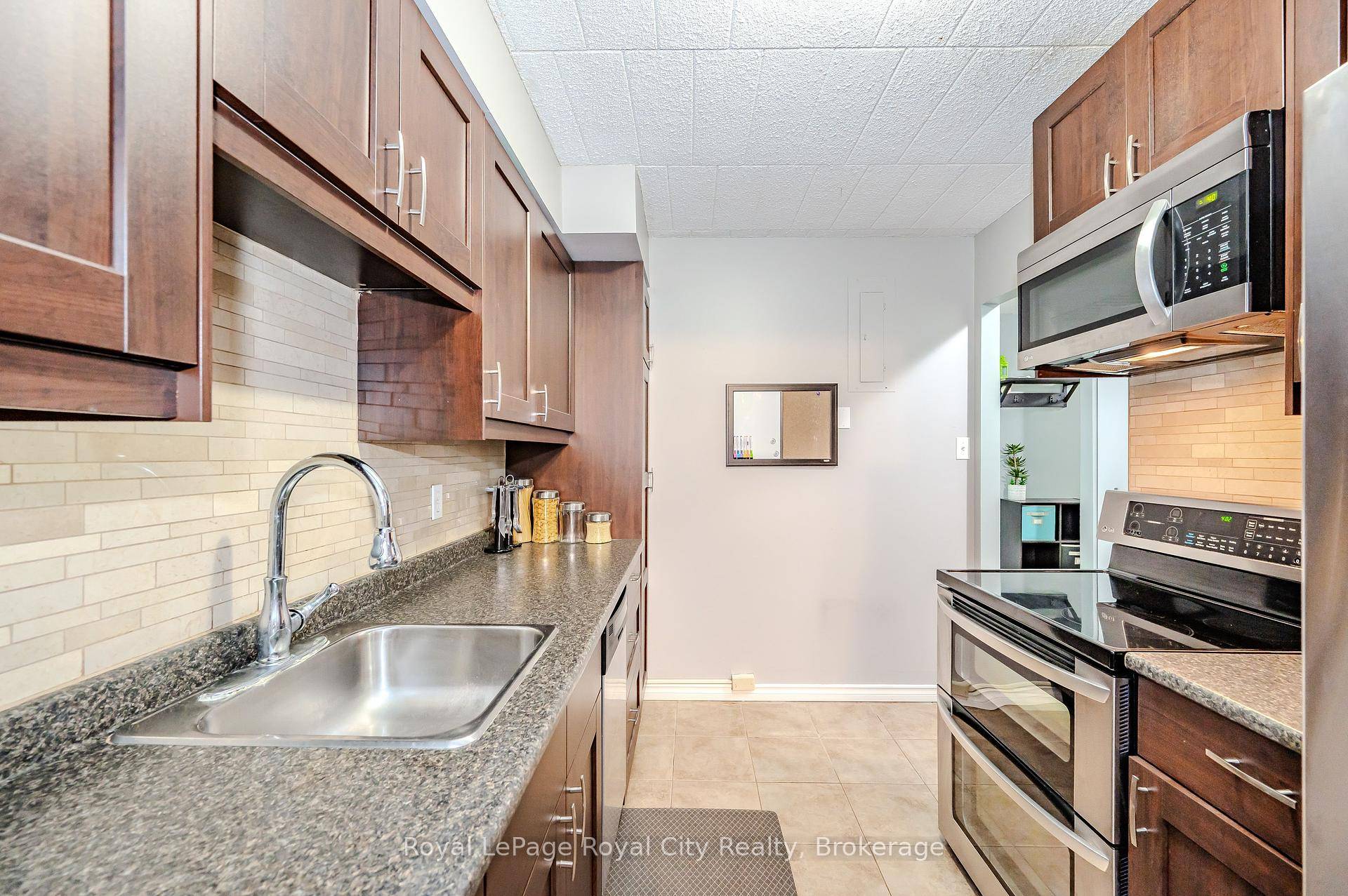 Welcome to 105 Conroy Crescent, Unit 511, a charming condominium located in Guelph, Ontario.