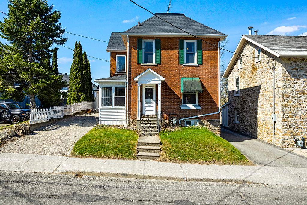 This classic two storey brick home, built in 1900, offers historic charm right in the heart of historic Perth.