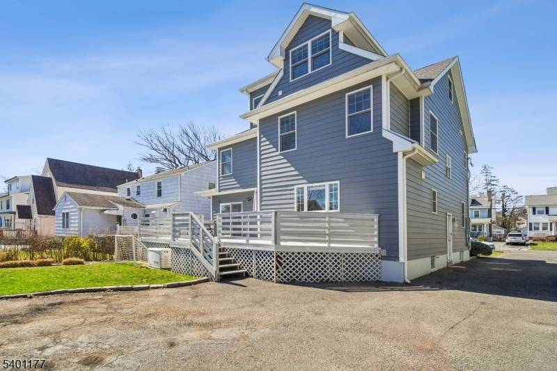 Perfection ! Beautifully renovated and desirable 5 bedroom, 4.