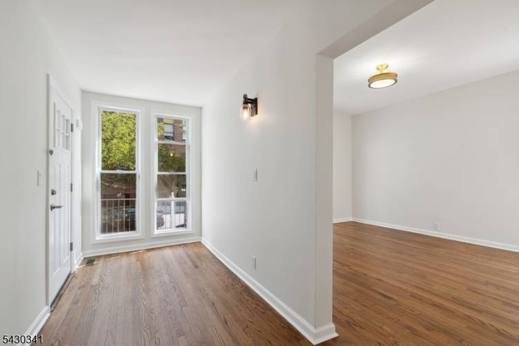 This exceptionally located rental, renovated in 2023 with high end finishes, offers a spacious and stylish living experience on the 1st floor unit with 3 bedrooms, an office or potential ...