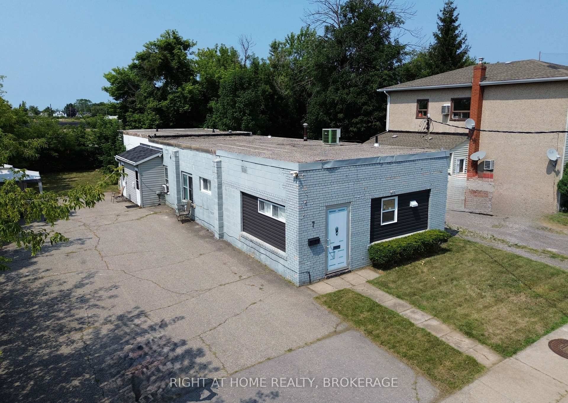 Renovated TRIPLEX with plans and permits in place to add 4 more units on the second floor.