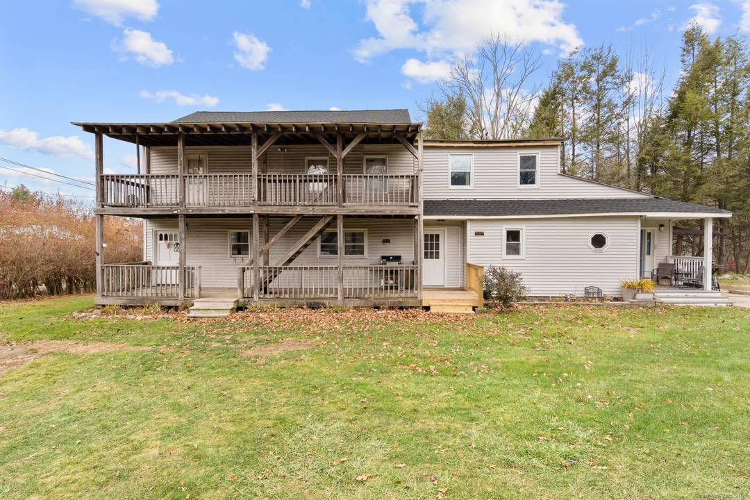 VALUE ADD Updated 2 Family on 3 Acres with Expansion Potential Well maintained and updated two family property situated on 3 private acres with a wooded backdrop.
