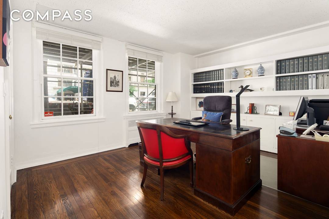 Lovely single story maisonette with a private entrance in a full service Upper East Side pre war cooperative.