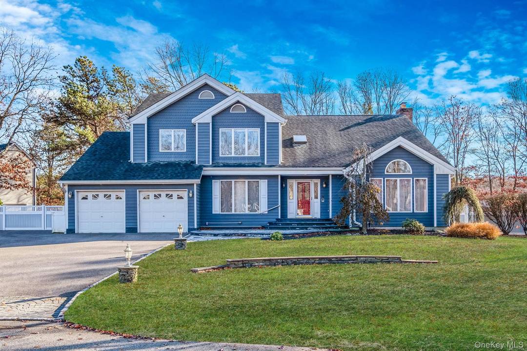 Welcome home ! 10 Cori Lane, located on a private cul de sac, has 5 bedrooms, 3 full baths and 1 half bath.