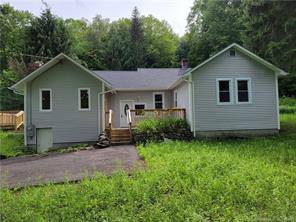 Completely remodeled ranch style home, Bordered by trees on 2.