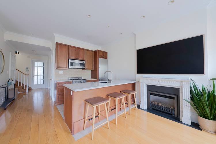 Elevate your lifestyle in this stunning three bedroom duplex residence with an expansive 1000 square foot, private, outdoor space.