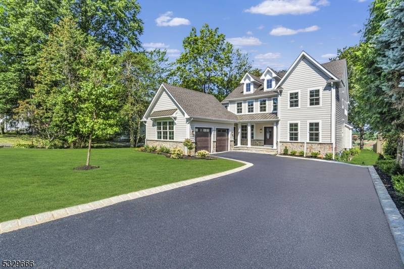 Welcome to this stunning custom home by Canuso Homes, offering nearly 6, 500 square feet of luxury across four levels.
