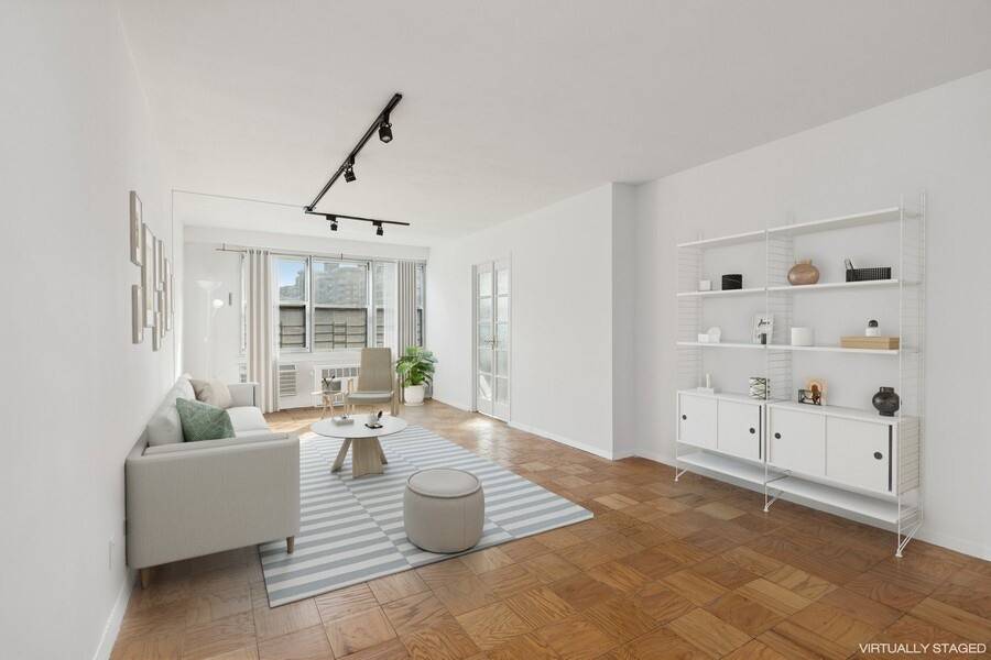 Exceptional split Two Bedroom, One and a Half Bath available at the beloved Amherst, 401 E 74 Owners Corp.