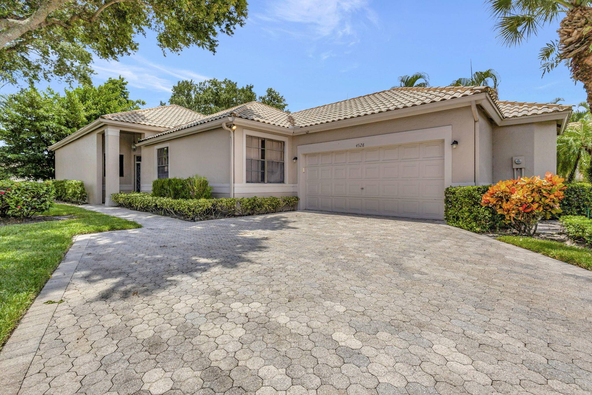 Take advantage of the season and enjoy this light filled corner lot home with a Silver non golf Equity Membership available.
