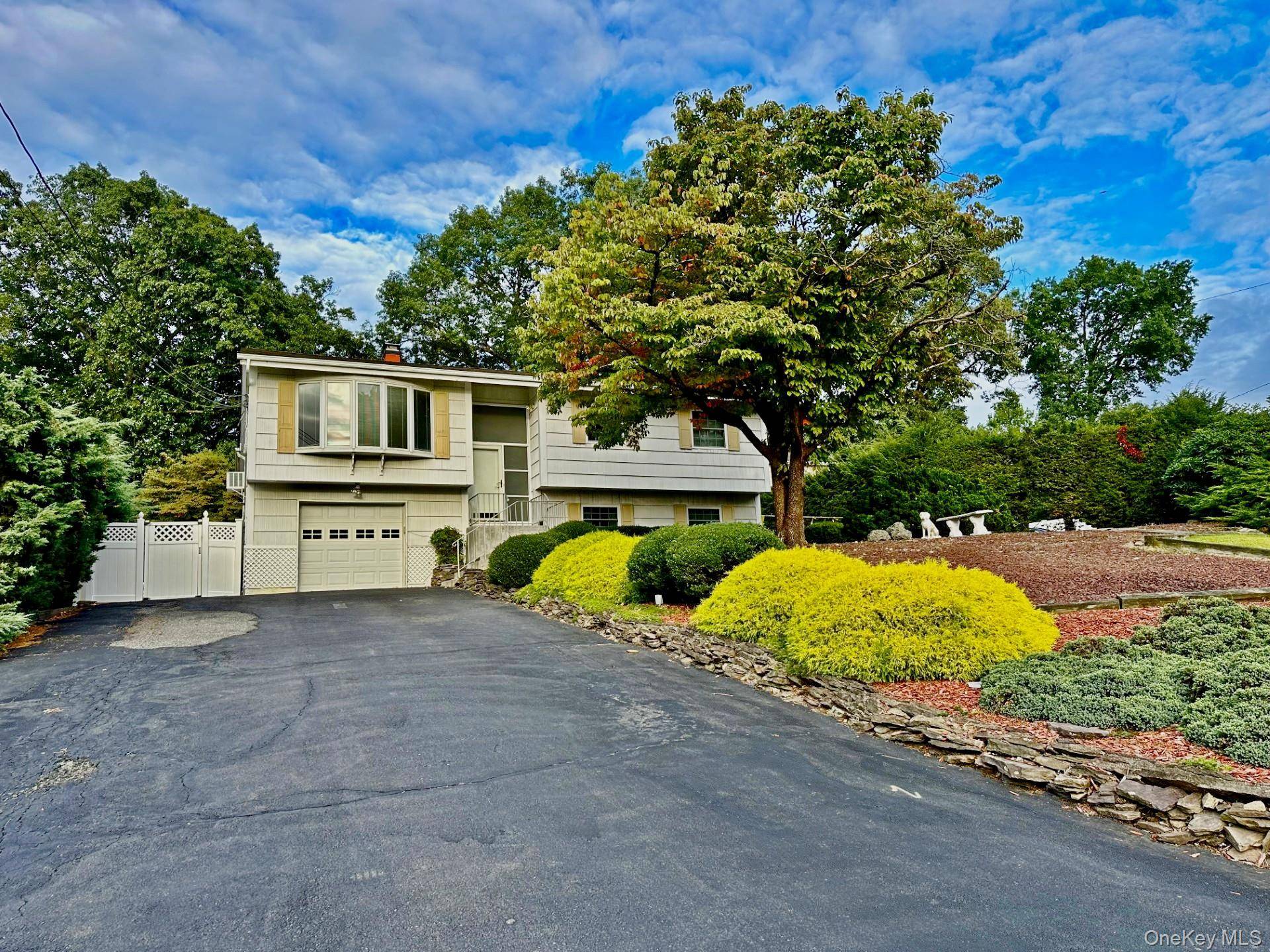 Beautifully maintained legal two family home available for rent !