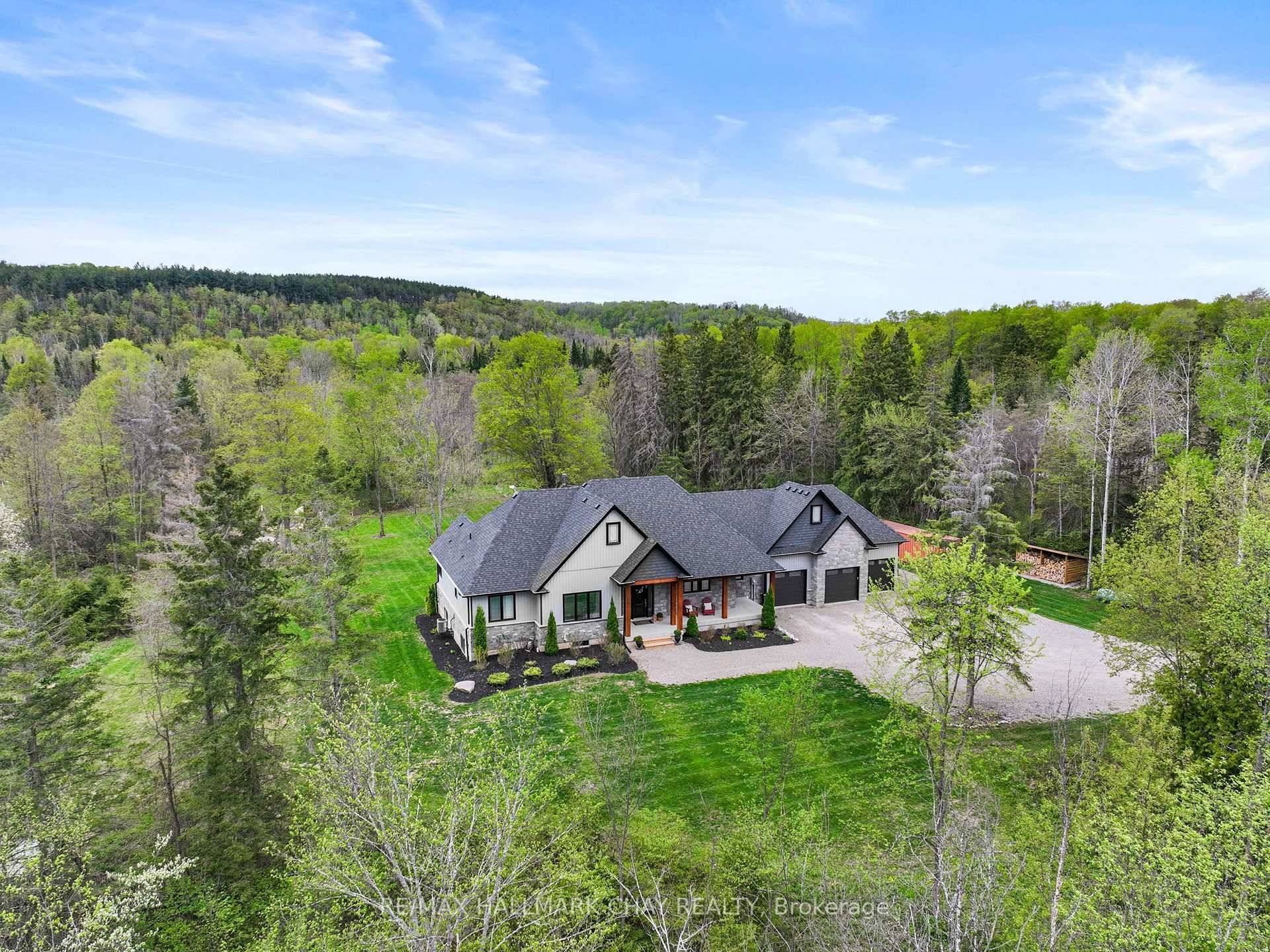 Welcome to this beautifully designed, custom built Bungalow nestled on 8.