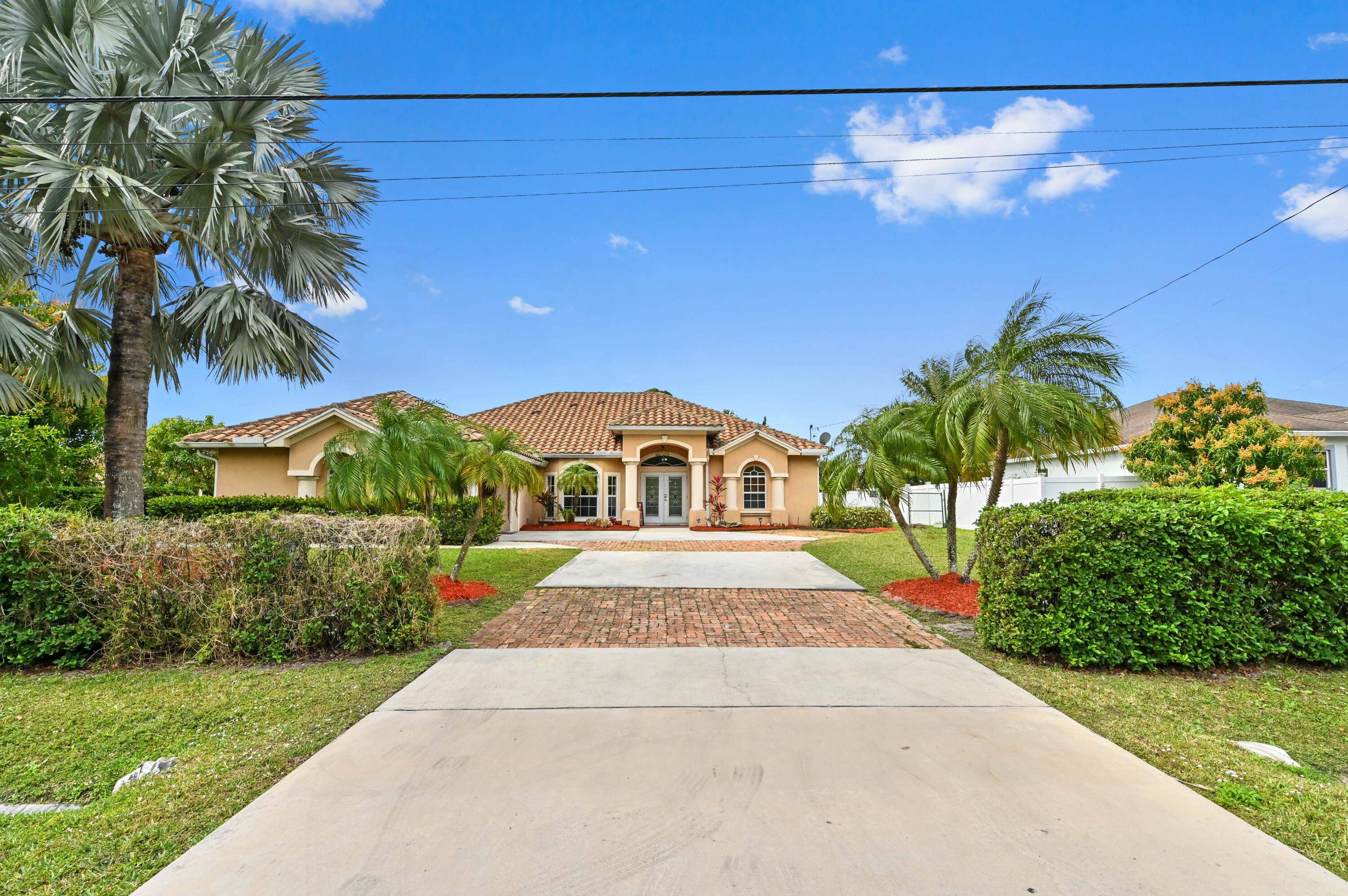 This beautiful updated open concept 3 bedroom 2 bath home with heated pool.