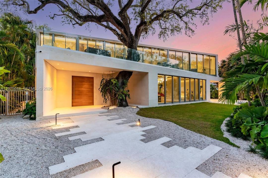 Introducing a brand new Tropical Modern ARCHITECTURAL MASTERPIECE in North Coconut Grove set on an oversized 11, 550 SF lot.
