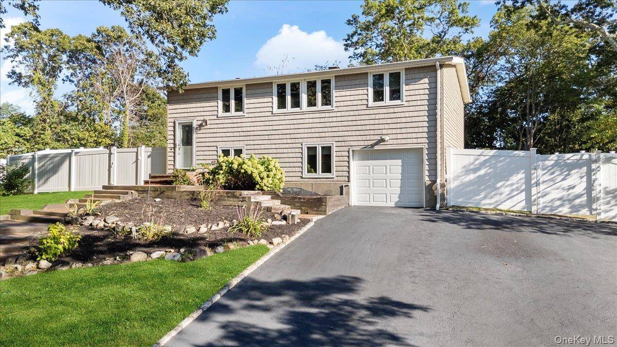 Welcome to 30 Bunny Lane in East Setauket, located in the highly sought after and award winning Three Village School District.