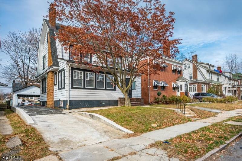 Welcome to this beautifully maintained four bedroom colonial, where modern conveniences blend harmoniously with classic charm.