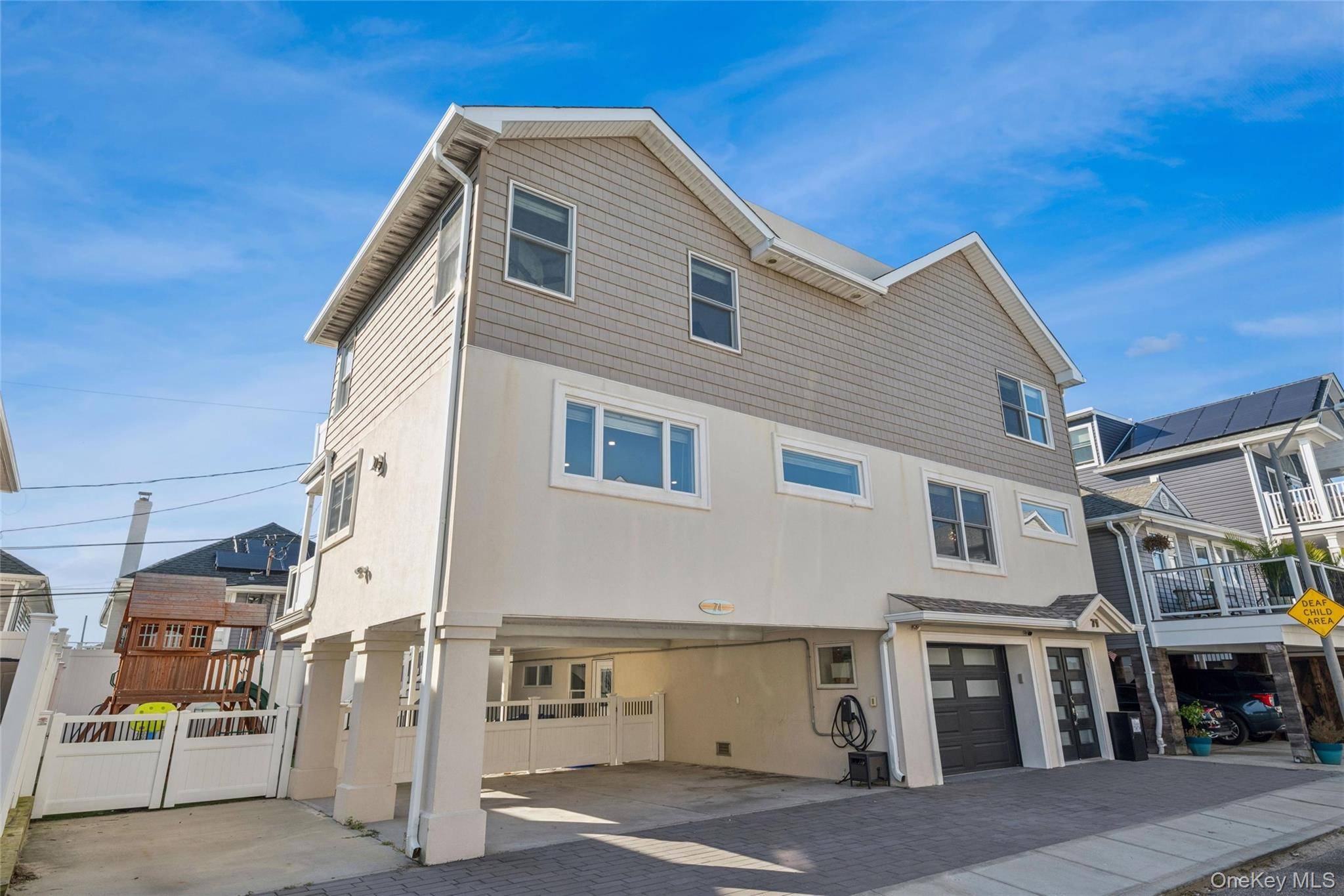 Welcome to 71 Michigan Avenue Where Coastal Luxury Meets Modern Sophistication Situated just 1, 000 feet from the pristine sands of Long Beach, this extraordinary 5 bedroom, 4.