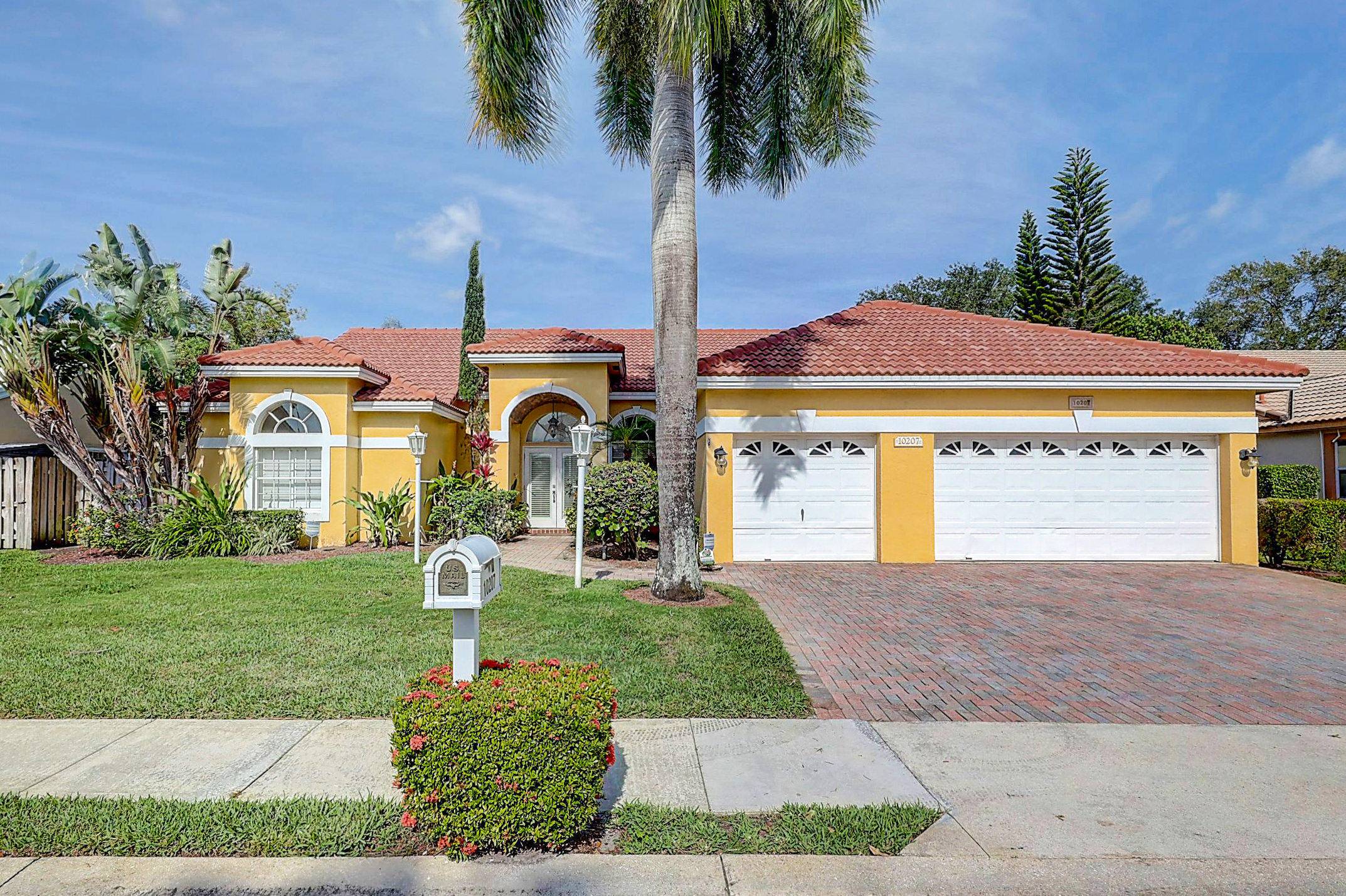4 bedroom 3 bath one story 3 car garage Siena Oaks pool home in the heart of Palm Beach Gardens !