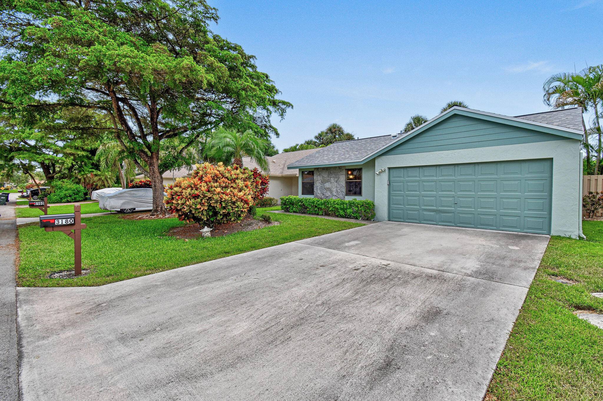 Welcome to this delightful Delray Beach home featuring a brand new roof and freshly painted exterior, combining classic charm with worry free living.