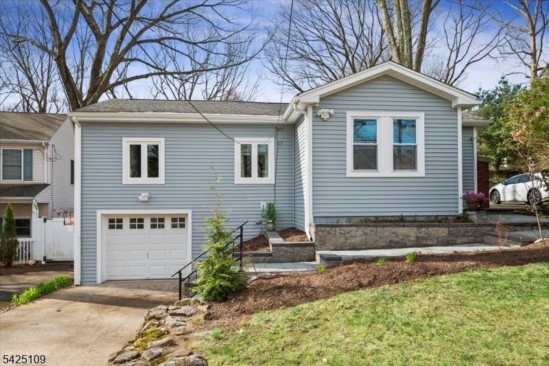 Welcome to this picture perfect ranch style home in sought after Rainbow Lakes.