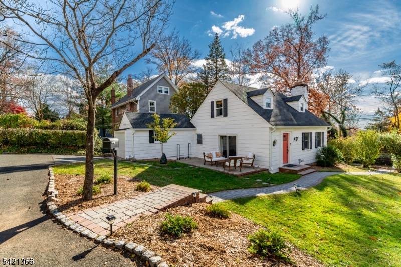 Tucked away on a quiet, private street in the heart of Millburn's highly sought after community, this move in ready three bedroom Cape offers the perfect blend of charm, comfort ...