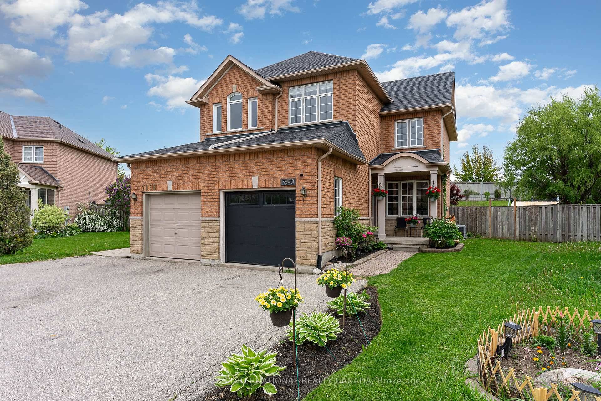 This wonderful four bedroom family home sits on a rarely offered and extremely deep 22.