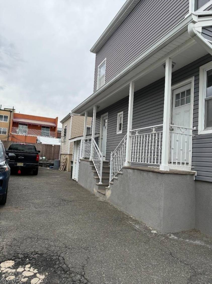 A well maintained property consisting of a 4 family plus 2 family and a 5 car garage.