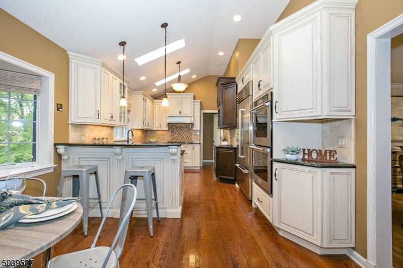 Beautifully renovated Paragano Ranch w circular driveway located in desirable Deerfield section.