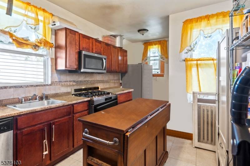 Versatile 2 Family with Bonus Space located in Newark's sought after Upper Clinton Hill, adjacent to the Weequahic section, this spacious legal 2 family offers exceptional potential perfect for investors ...