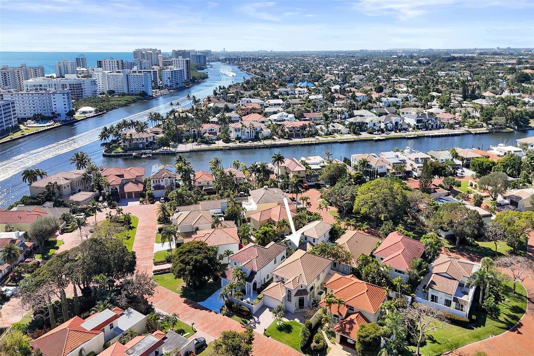 Magnificent 2 story estate in Pelican Harbor w a 70' dock amp ; no fixed bridges, close to Lake Boca amp ; ocean.