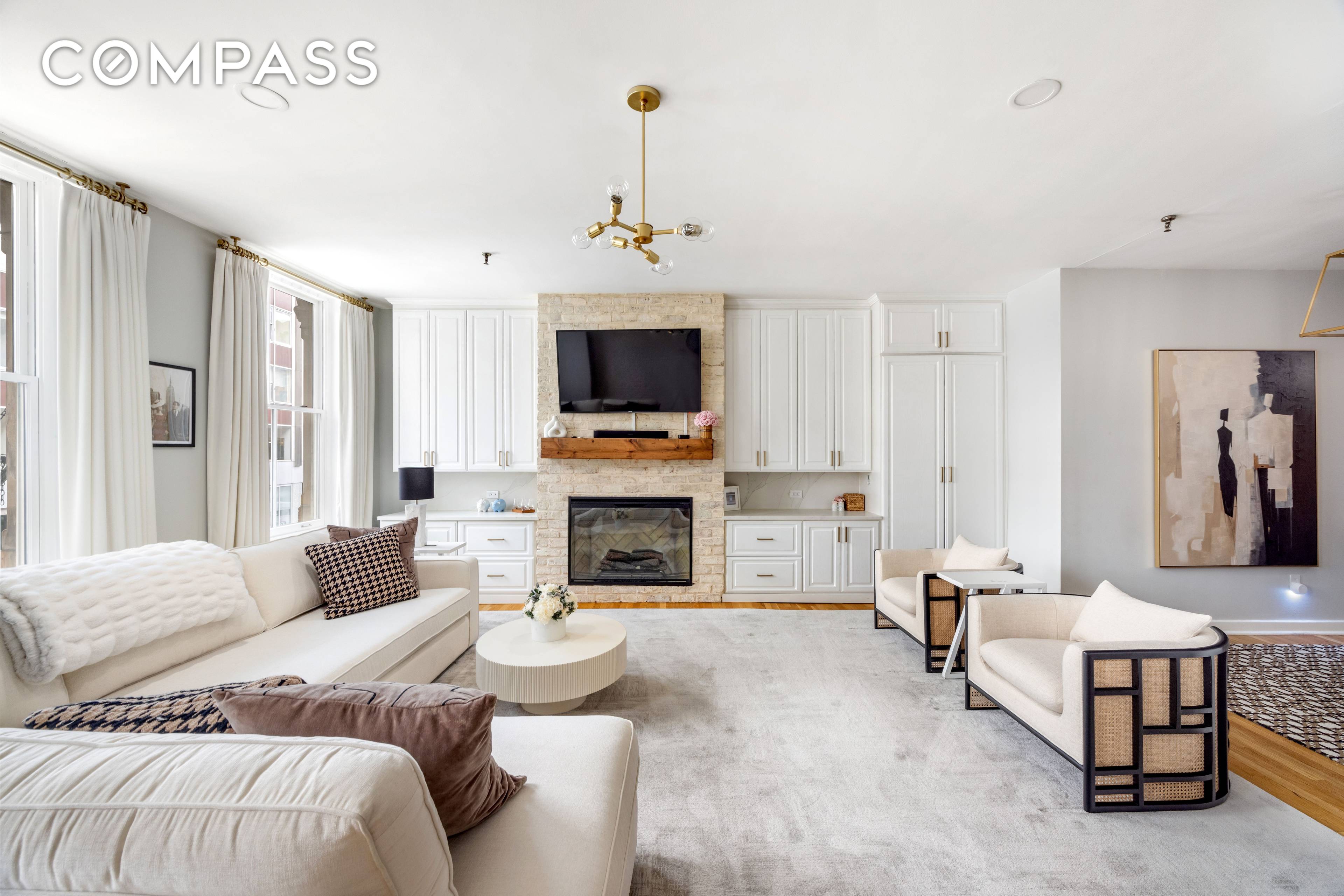 This meticulously renovated 2nd floor 3 bed, 2 bath loft boasts soaring ceilings, exposed brick and hardwood floors throughout.