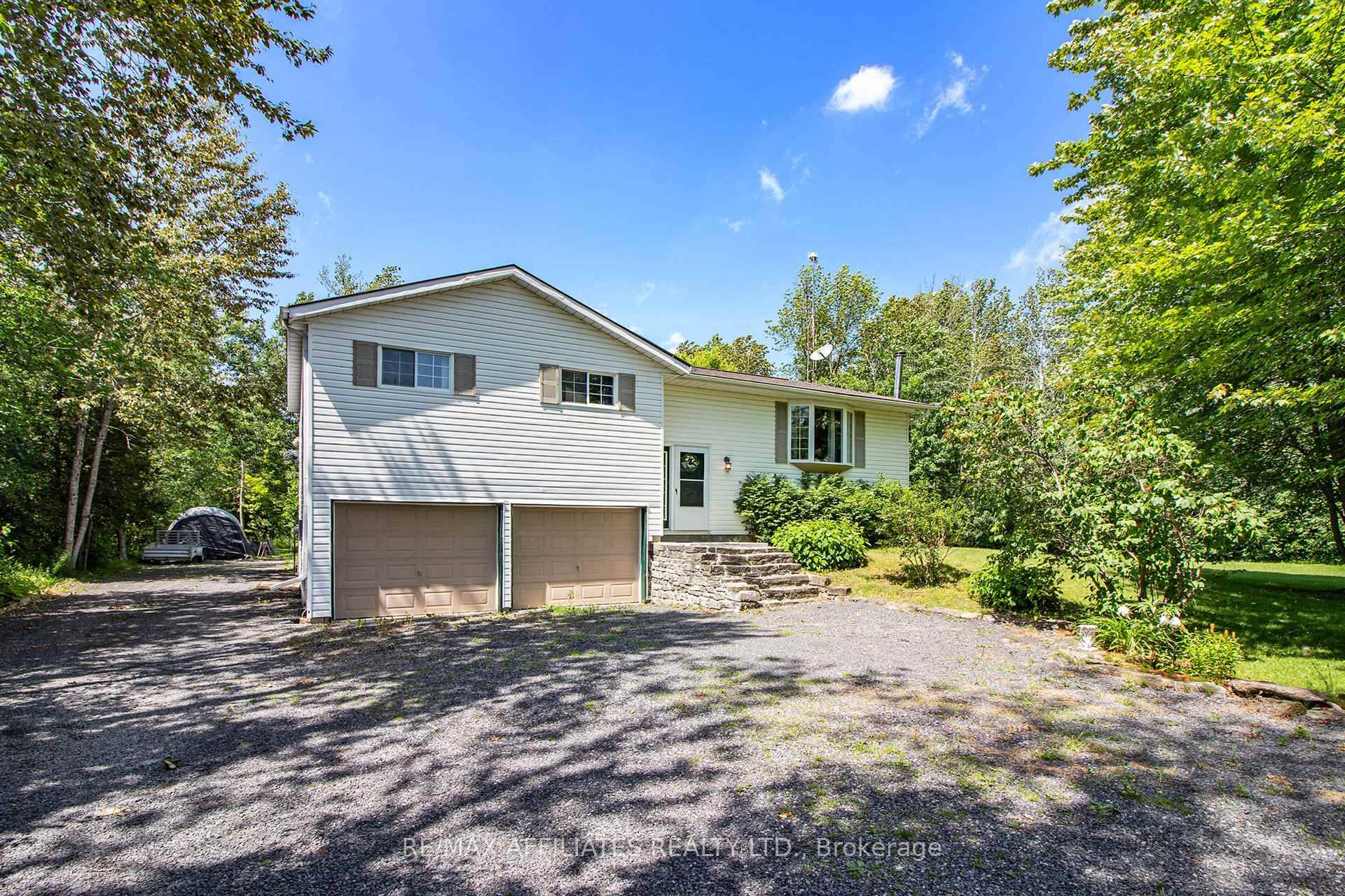 Welcome to 9674 Hall Road, a charming 3 bedroom, 1 bathroom home nestled on a beautiful 2 acre lot, offering the ideal mix of privacy and convenience.