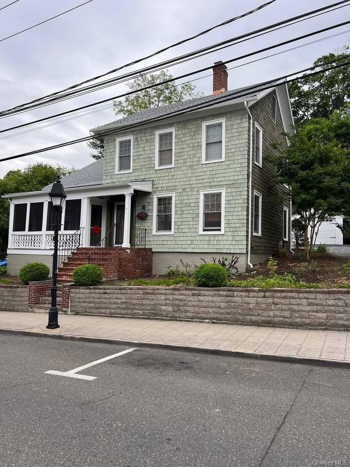 The Evolution of Home Design The property is a grand 1870s antique historic home in the heart of Port Jefferson Village.