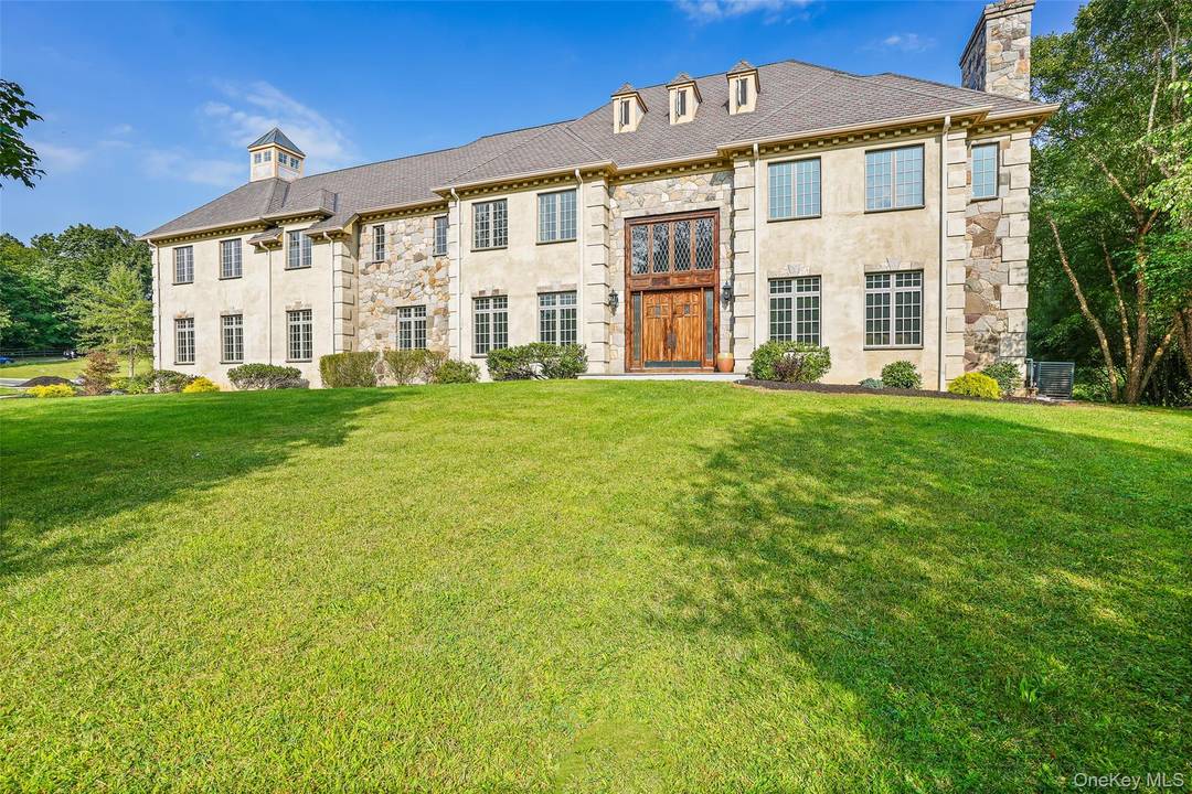 Experience refined living in this breathtaking 5, 600 sq ft contemporary estate, masterfully crafted in 2006 and remodeled in 2023, with stone, stucco, oak, and timeless design.