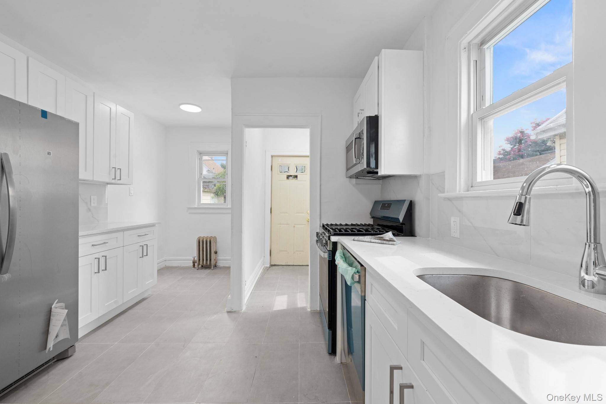 Opportunity Knocks ! Tucked away on a beautiful, quiet, tree lined street of Hollis 197 16 99th road is a move in ready single family sitting on a 40x90 lot ...
