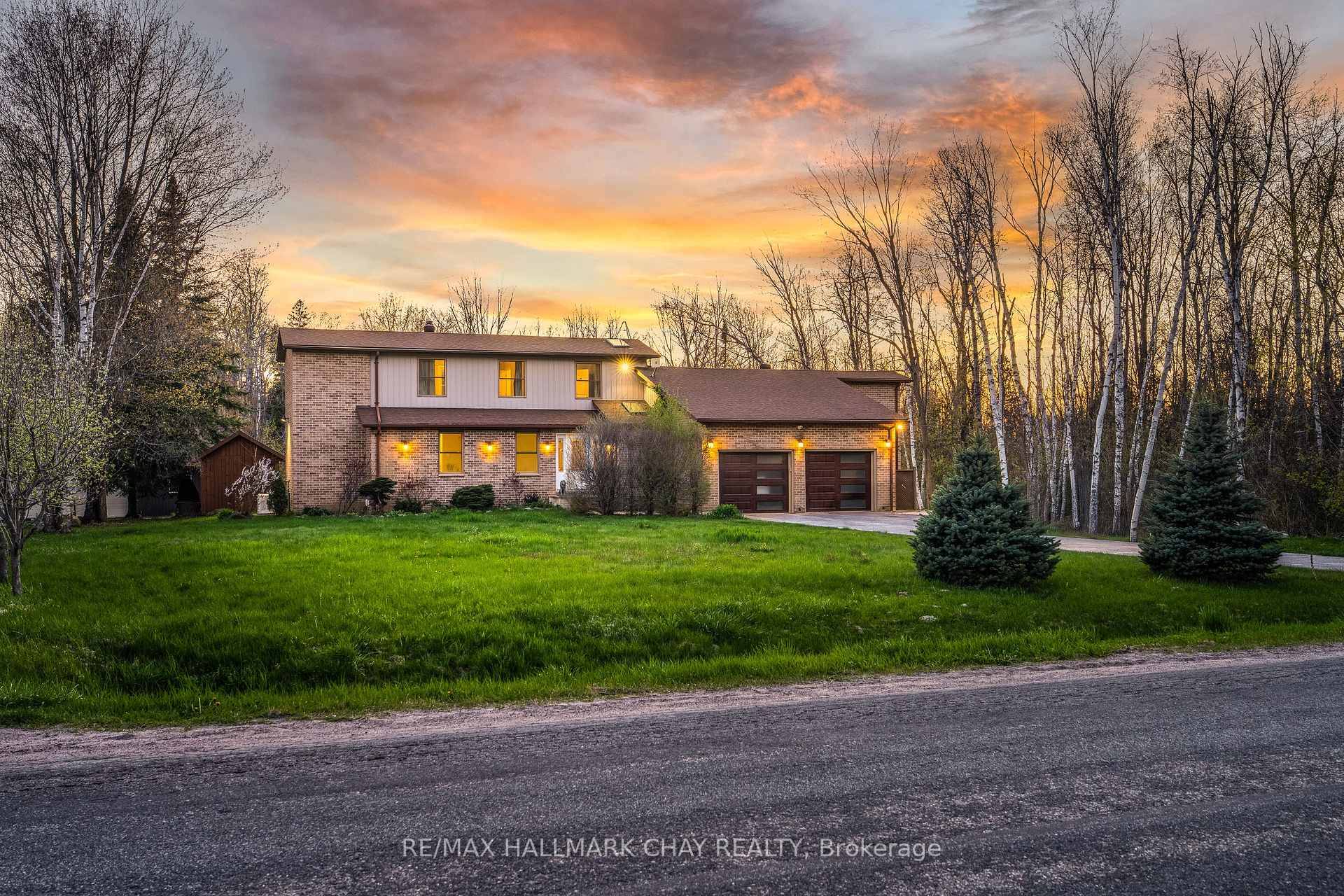 Executive Family Home Nestled On 10 Acres Of Private Land With 1, 200 SqFt Detached, Insulated Workshop With Double 7x9Ft Doors, amp ; a second Driveway.
