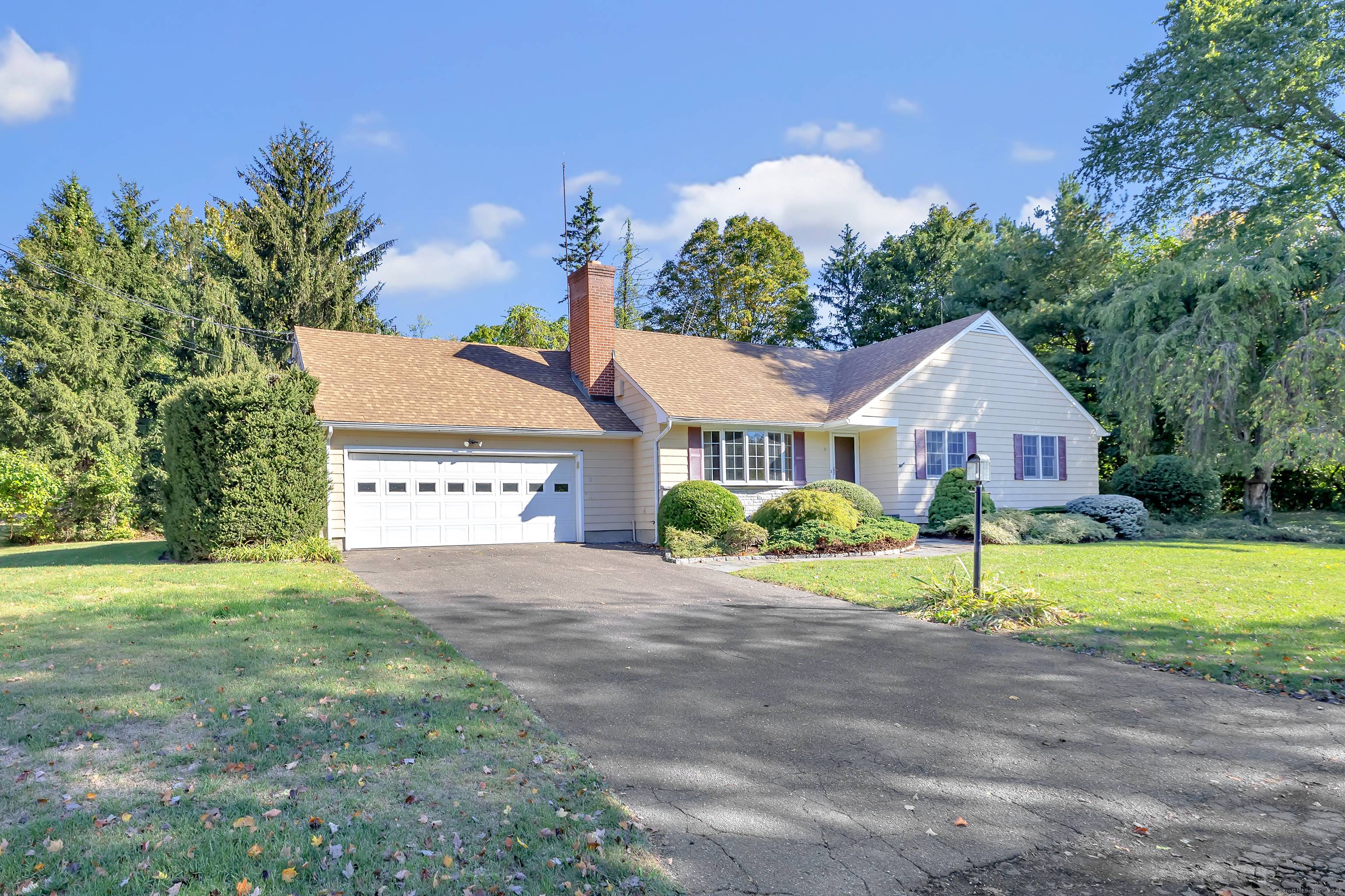 Welcome to 11 Laurel Street in Trumbull, a custom built gem tucked away in Trumbull's sought after Daniels Farm area.