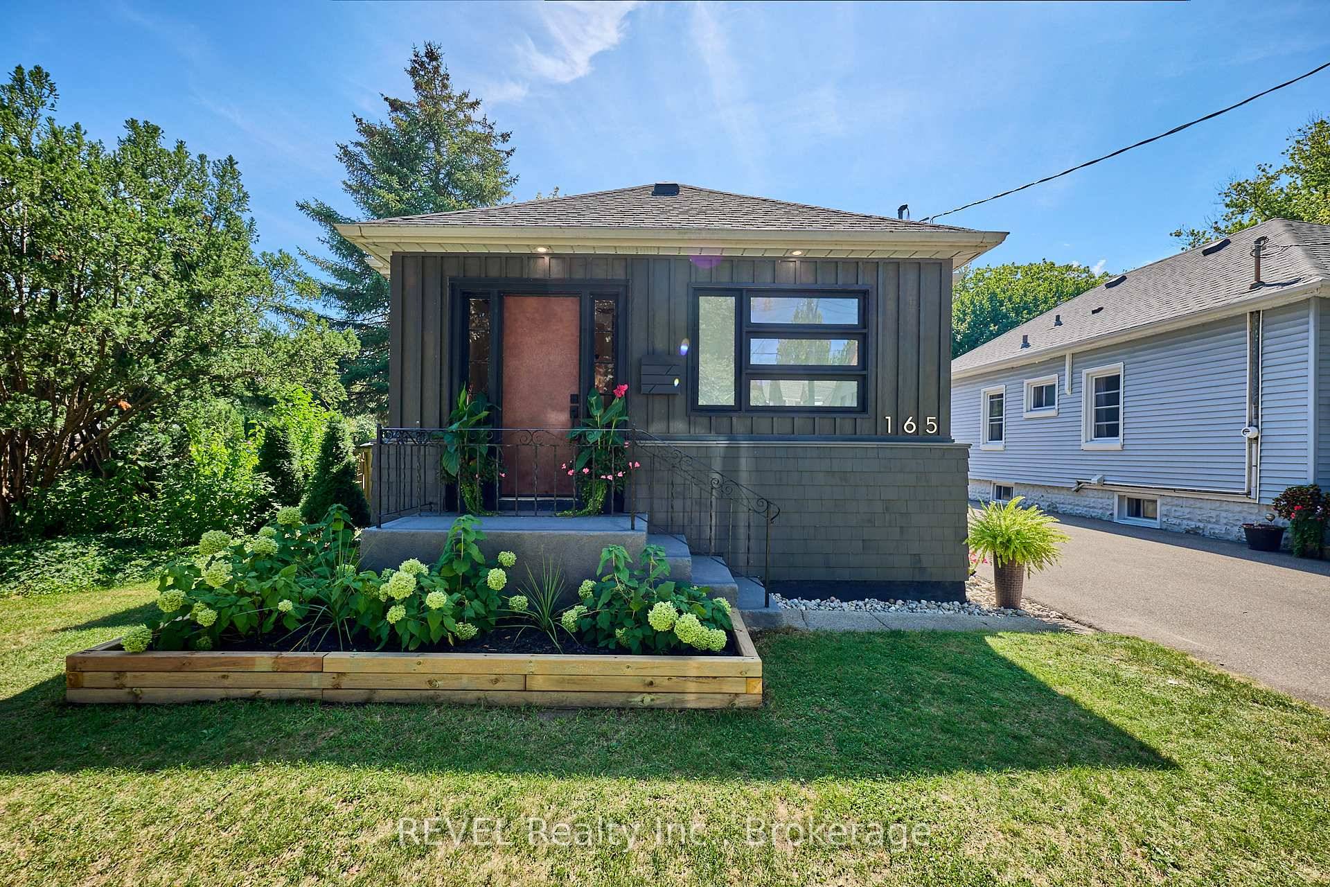 Welcome to 165 Main St., an adorable bungalow featuring 2 bedrooms and 1.