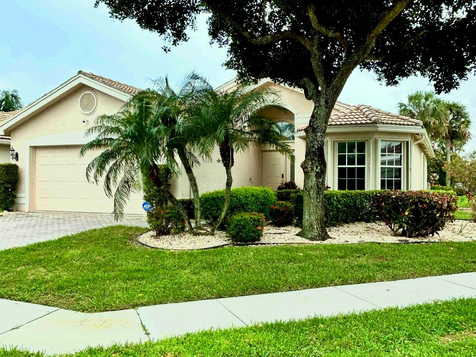 LOVELY LIGHT AND BRIGHT ADRIATIC MODEL IN THE ADULT GATED COMMUNITY OF VALENCIA FALLS ON AN OVERSIZED PRIVATE CORNER LOT.
