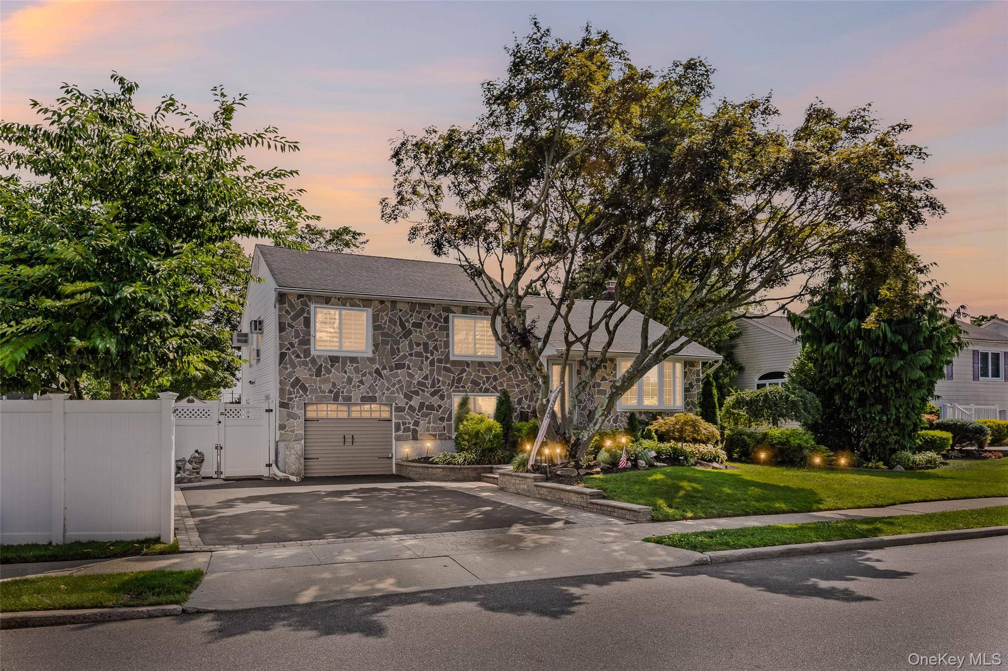 Welcome to this stunning split style home in the heart of Bethpage, NY, offering a perfect blend of comfort and modern luxury.